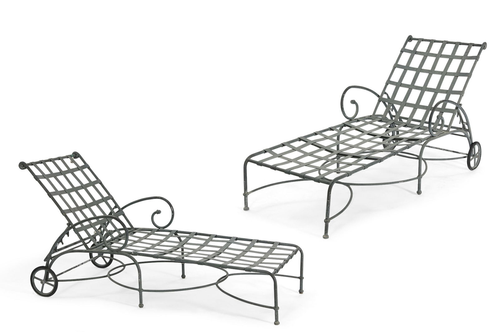 A pair of Brown Jordan Florentine chaises longue: A pair of Brown Jordan patinated metal Florentine chaises longuepost 1950height 41in (104cm); width 28in (71cm); depth of seat 47in (119.5cm) Provenance: Property from a historic Beverly Hills residen