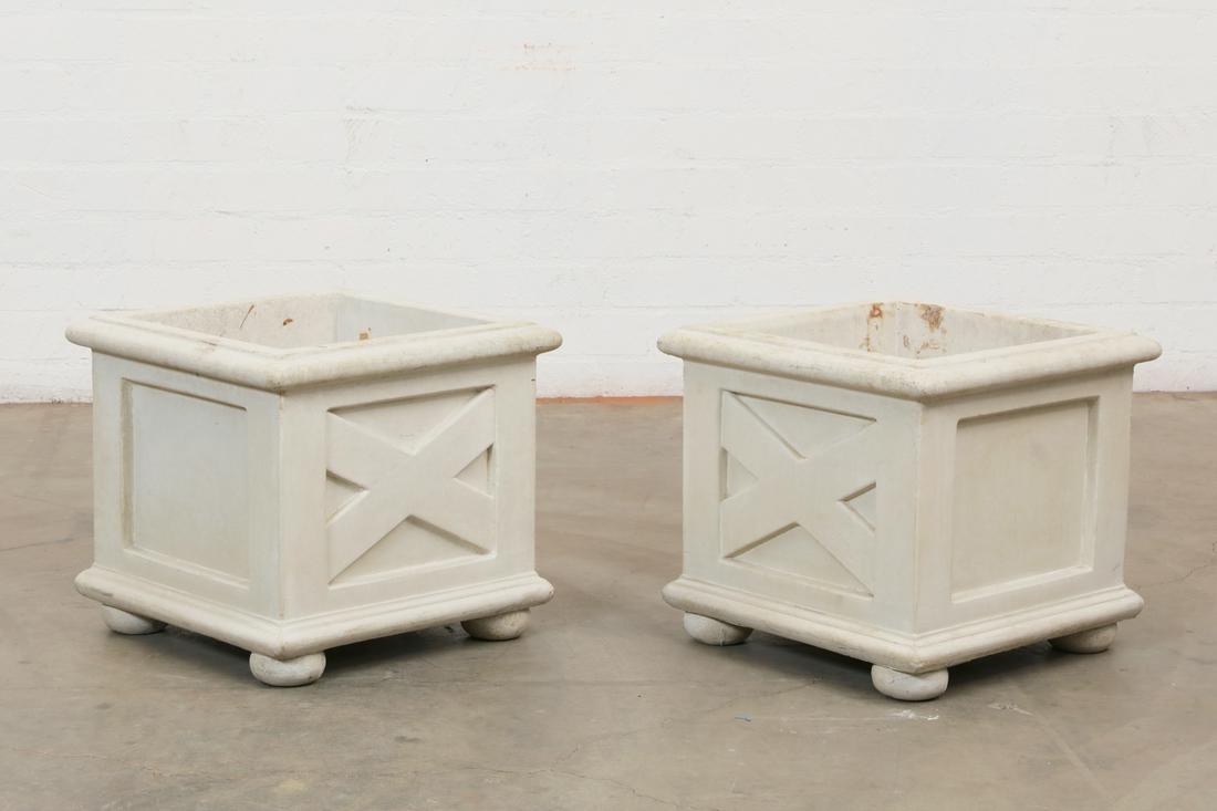 A pair of cast stone square jardineres, post 1950: A pair of cast stone square jardineres post 1950 height 18 1/2in (47cm); width 20in (51cm) square Provenance: Property from the collection of Mr. and Mrs. Mark Goodson, Beverly Hills, California.