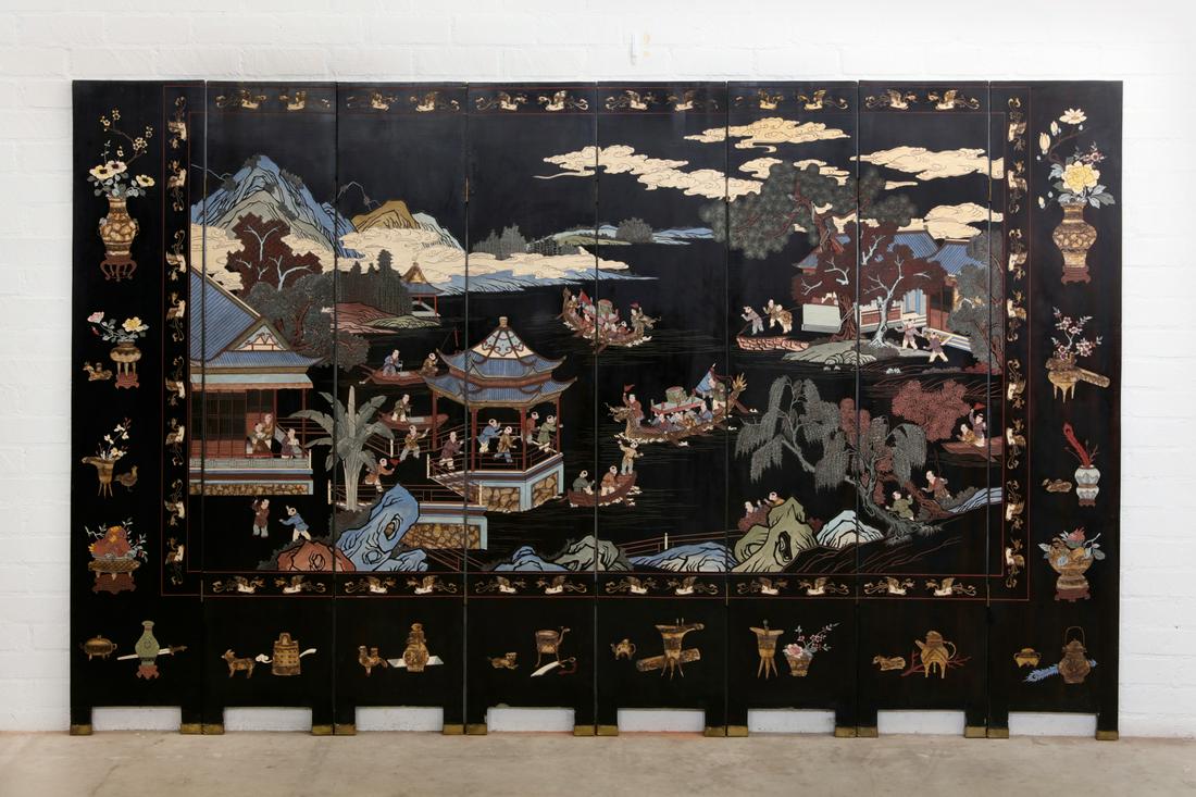 A Chinese coromandel eight panel floor screen (1 of 3)