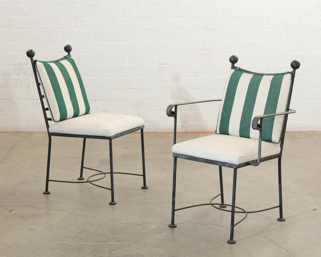 A pair of black painted metal garden chairs (1 of 2)