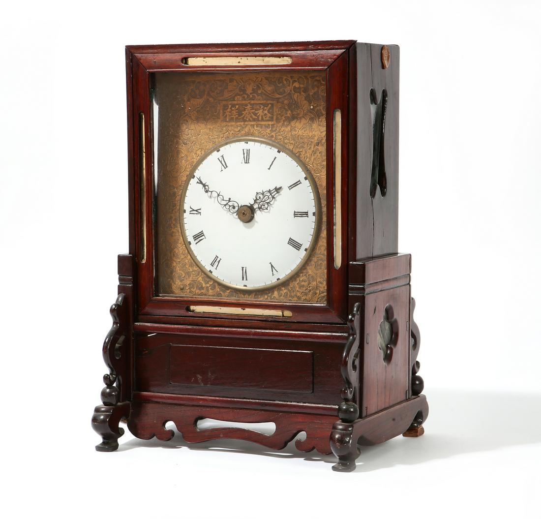 A Chinese carved hardwood mantel timepiece (1 of 9)