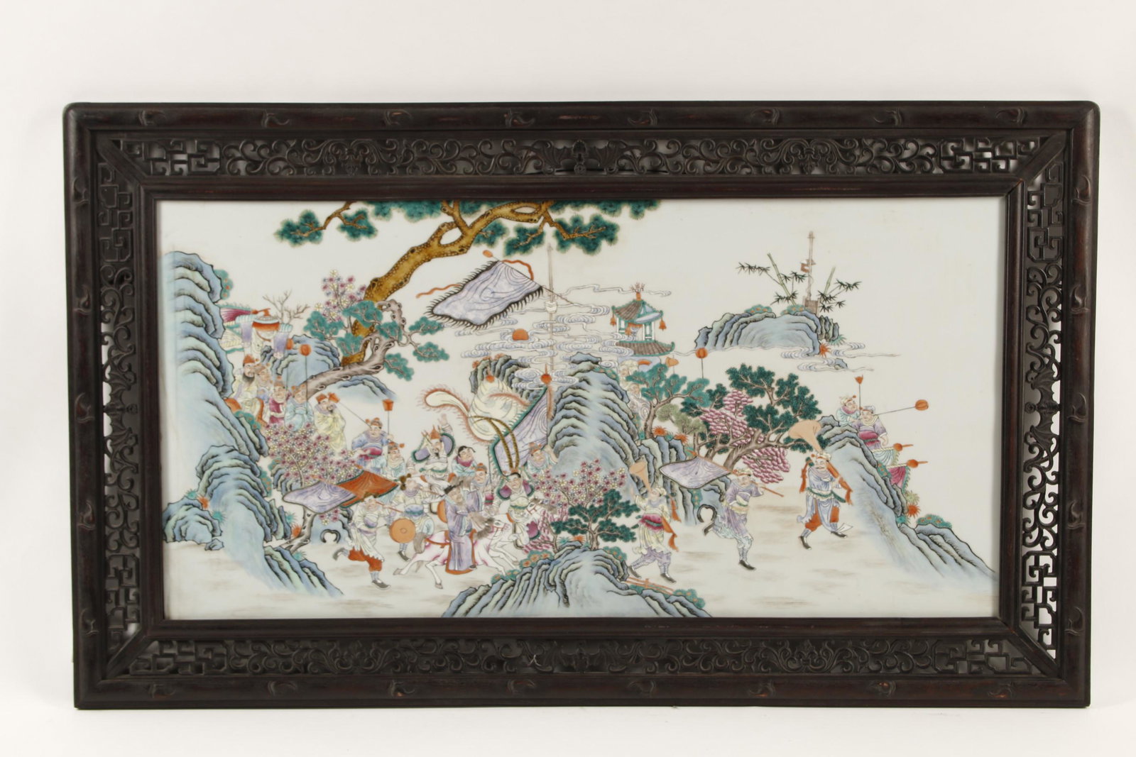 A Chinese porcelain panel in a hardwood frame (1 of 4)
