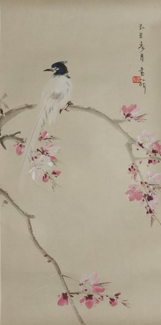 A Chinese scroll painting depicting a bird: A Chinese scroll painting on paper depicting a bird on a branch24 x 11in (61 x 28cm); overall 59 x 15 1/2in (150 x 39.5cm) Provenance:Property from a Private Collection, Seattle, Washington.