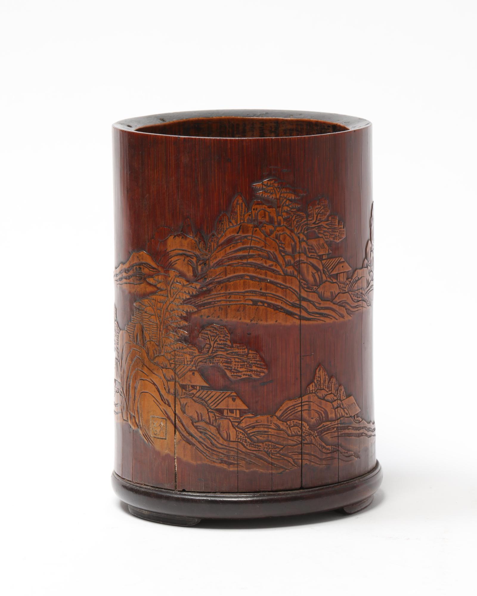 Chinese carved bamboo & hardwood brush pot: A Chinese carved bamboo and hardwood brush pot With mark to side. height 5 5/8in (14.5cm); diameter 3 3/4in (9.5cm) Provenance: Property from a Private Collection, Seattle, Washington.