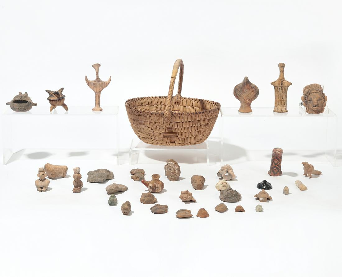 A group of Mesoamerican pottery votive figures (1 of 1)