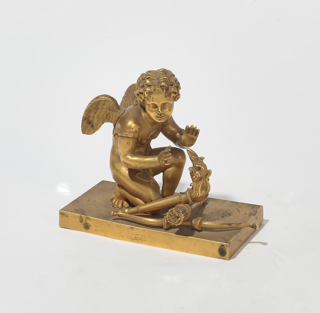 An Empire gilt bronze model of Cupid with a torch (1 of 3)