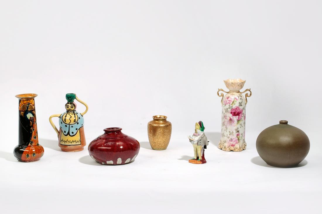 Seven porcelain and earthenware vases: Seven Continental porcelain and earthenware vases 20th century the largest height 9in (23cm); width 6 1/2in (16.5cm) Provenance: Property from the collection of the late Basil W. R. Jenkins, Californi