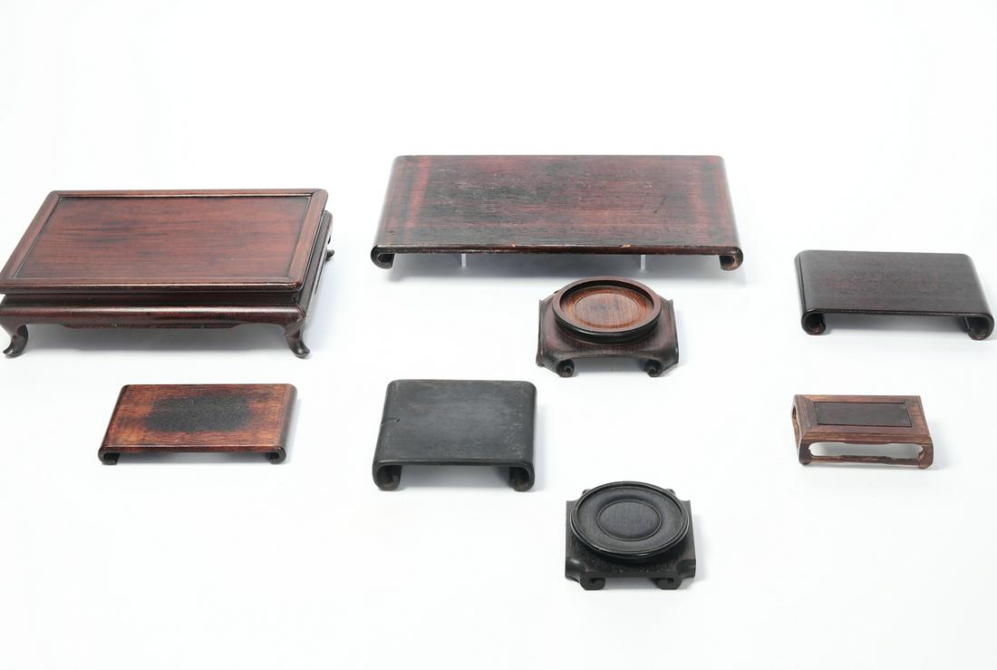 Eight Chinese hardwood stands (1 of 1)