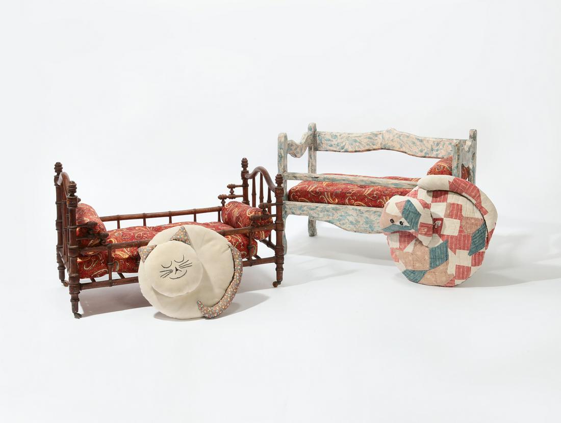 Two miniature daybeds, late 19th-20th century: Two miniature daybedslate 19th-20th centuryOne faux bamboo, one white and blue painted, similarly upholstered.the larger height 14 1/2in (37cm); width 21in (53.5cm); depth 11 1/2in (29cm) Provenance: