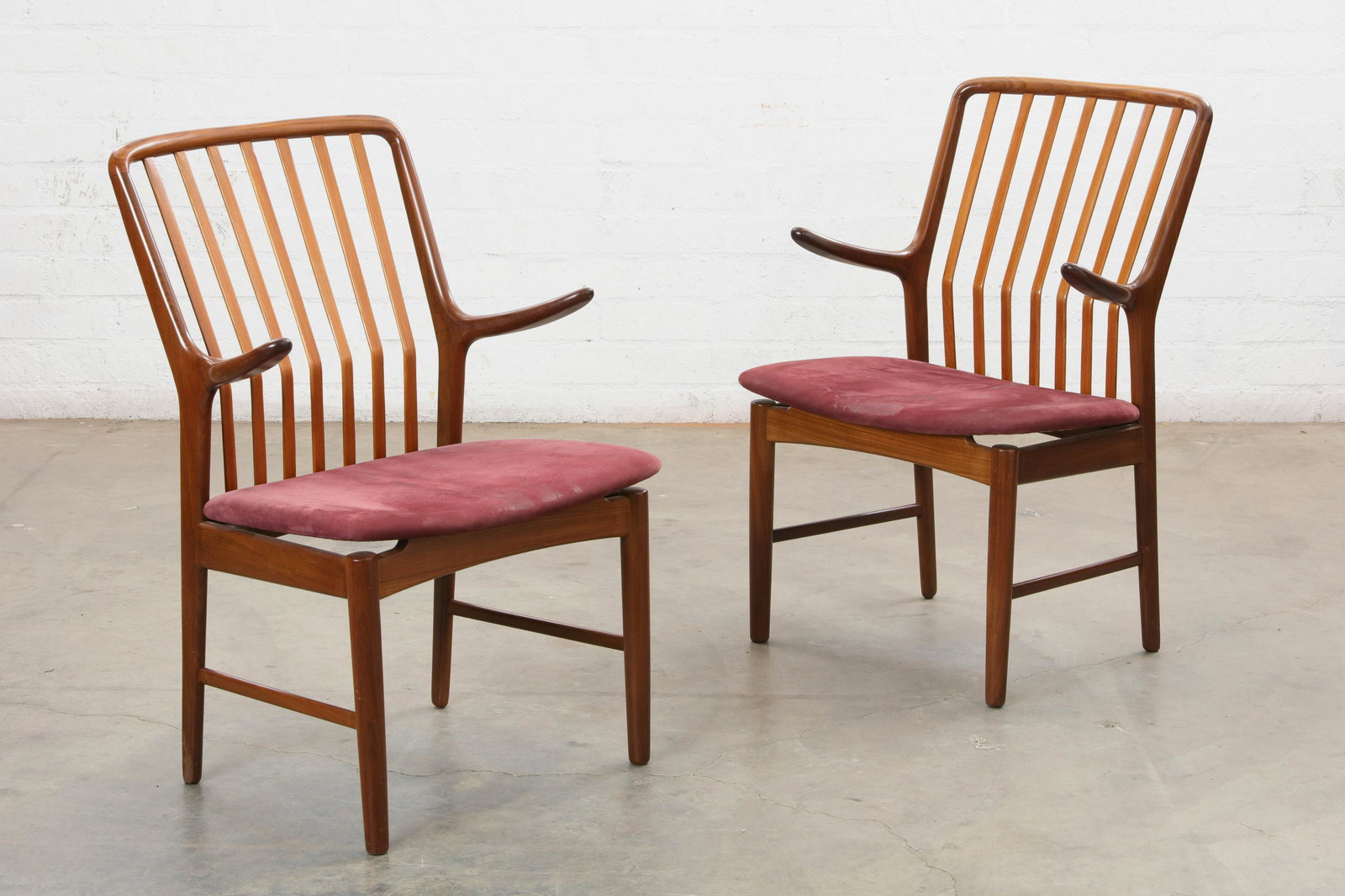 A pair of Danish Modernist teak armchairs (1 of 3)