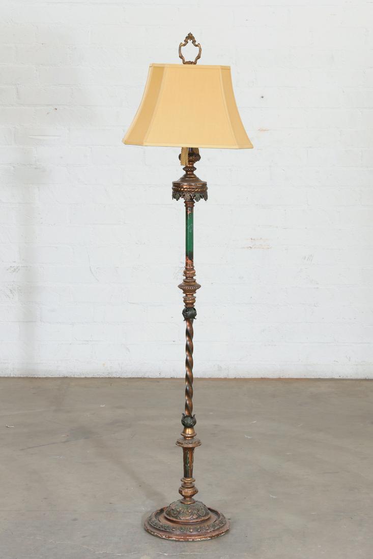 A gilt metal and green paint decorated lamp (1 of 2)