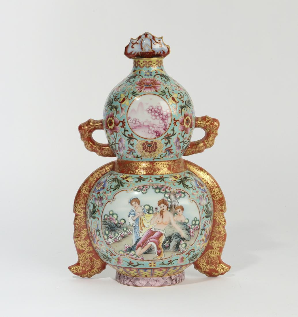 A Chinese enameled porcelain wall applique (1 of 3)