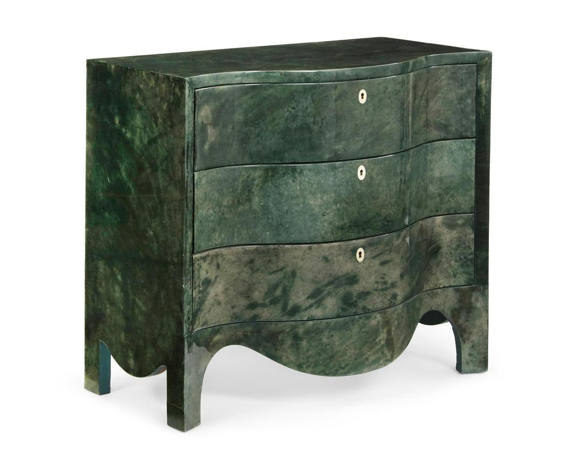 A faux shagreen serpentine chest of drawers: A faux shagreen decorated serpentine chest of drawers post 1950 height 32in (81cm); width 36 1/4in (92cm); depth 17 3/4in (45cm)