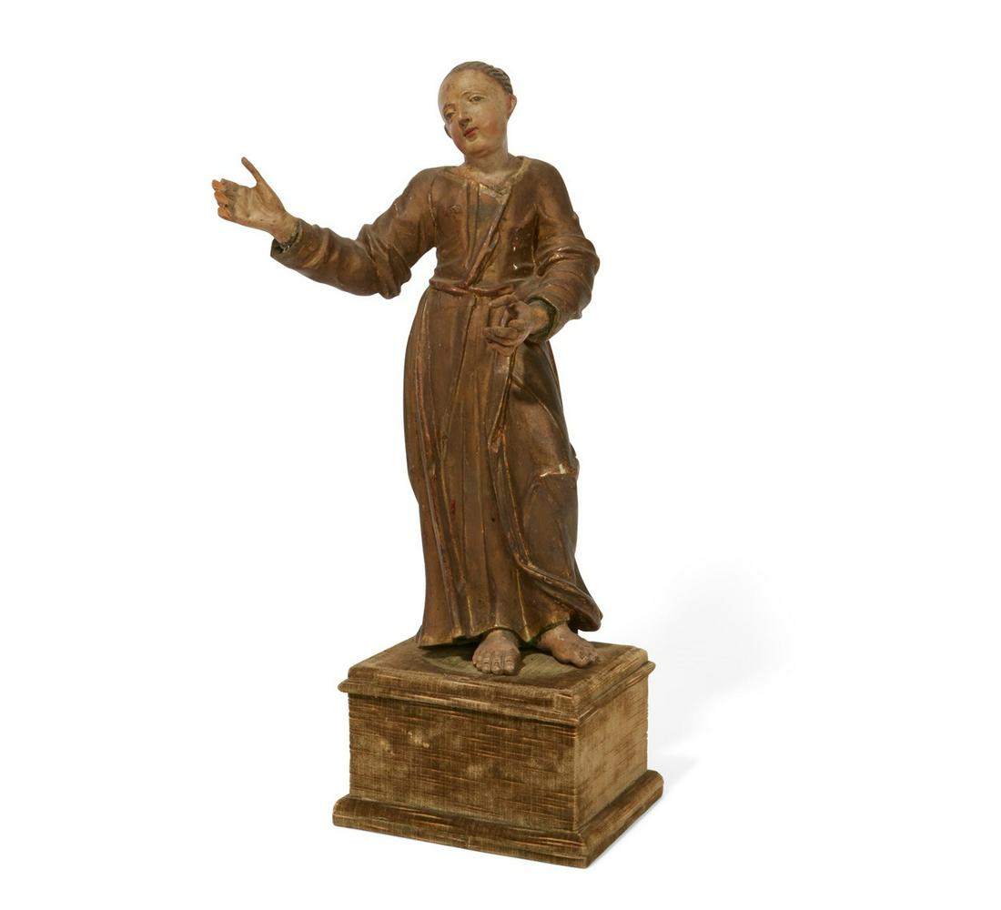 An Italian polychrome decorated model of a woman (1 of 4)