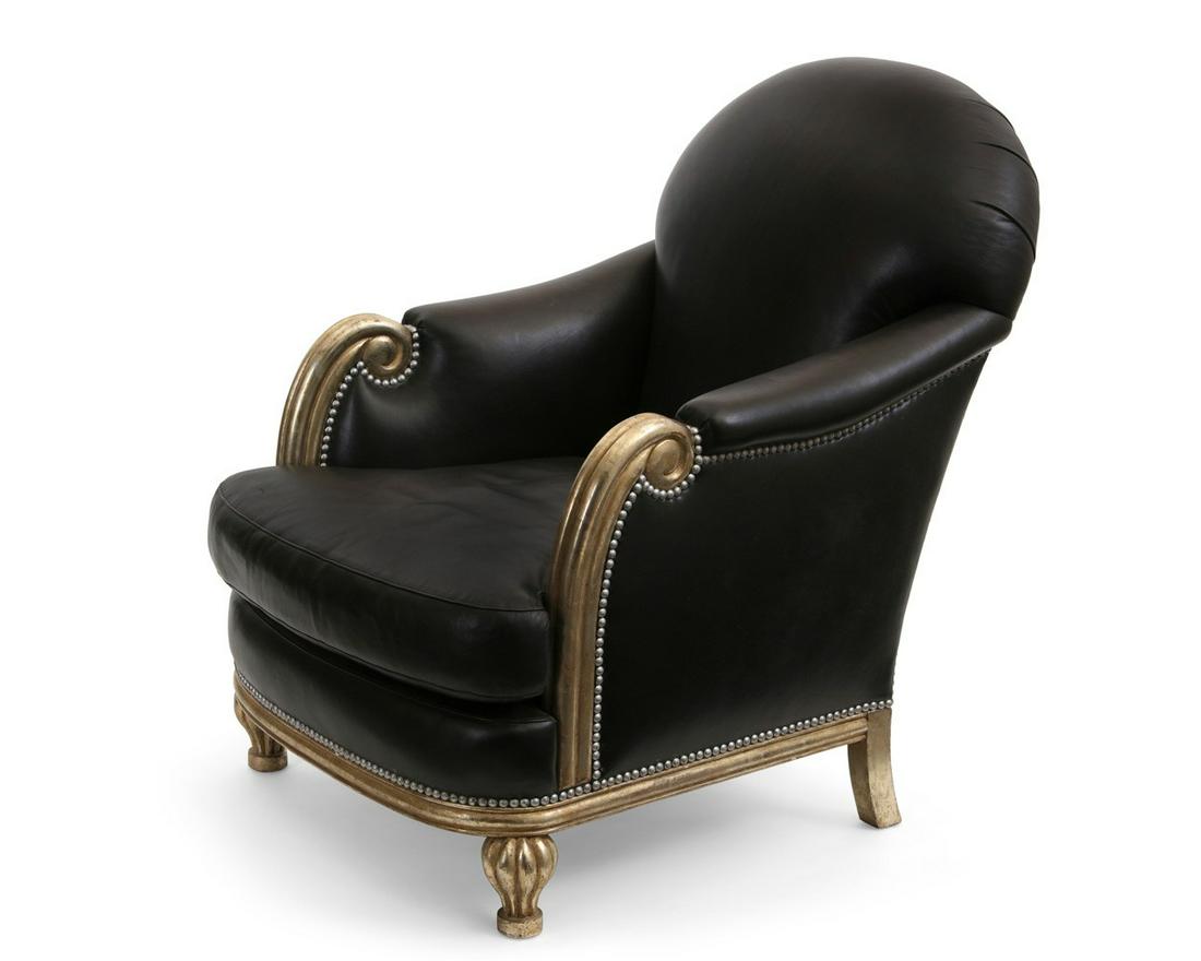 An Art Moderne leather upholstered bergere: An Art Moderne silvered and leather upholstered bergere post 1950 height 35in (89cm); width 28 1/2in (72.5cm); depth of seat 22 1/2in (57cm)