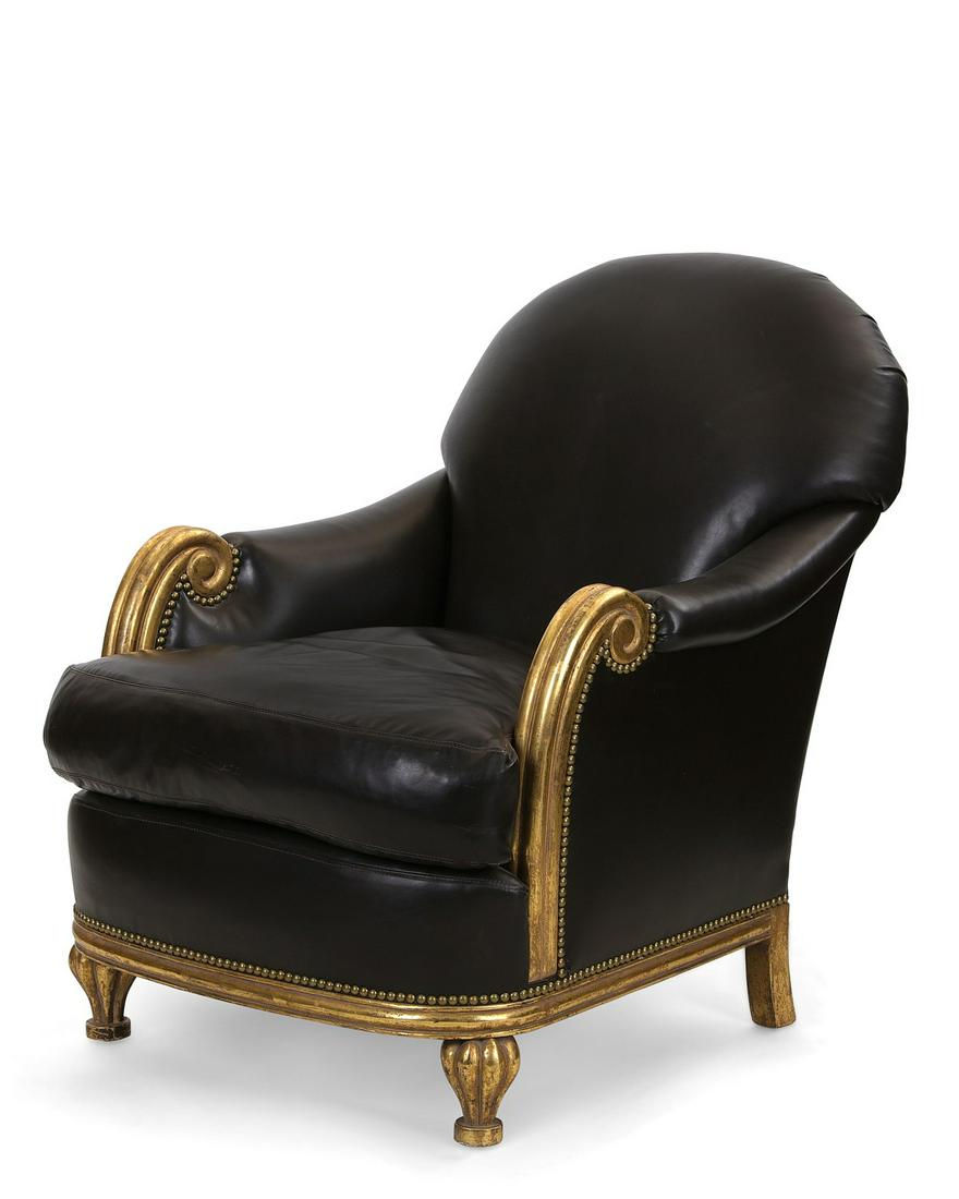 An Art Moderne leather upholstered bergere: An Art Moderne giltwood and leather upholstered bergere post 1950 height 35in (89cm); width 28 1/2in (72.5cm); depth of seat 22 1/2in (57cm)