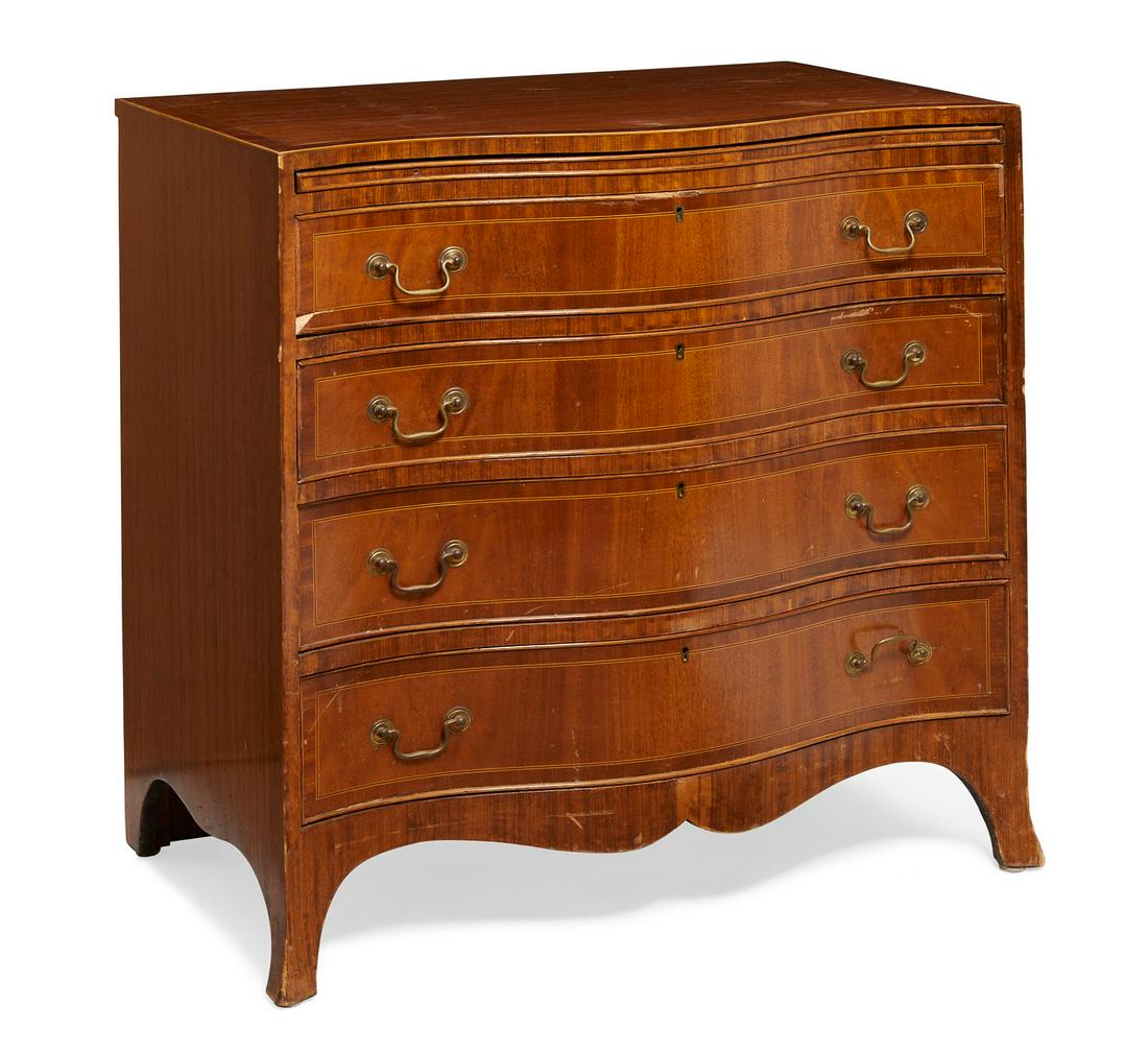 A George III style serpentine chest of drawers: A George III style mahogany serpentine chest of drawers 20th century height 31 1/4in (79.5cm); width 30in (76cm); depth 19in (48cm)