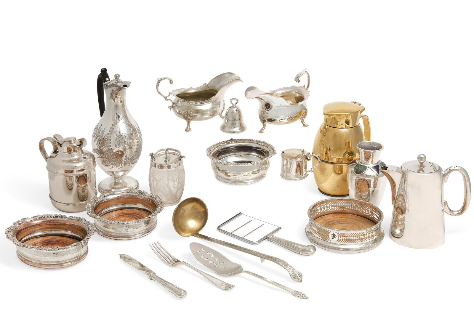 A large collection of International metalware: A large collection of International silverplate and metalware flatware and tablewarevarious makerslate 19th-20th centuryIncluding wine coasters, toast racks, pitchers, casters, sauce boats, condiment