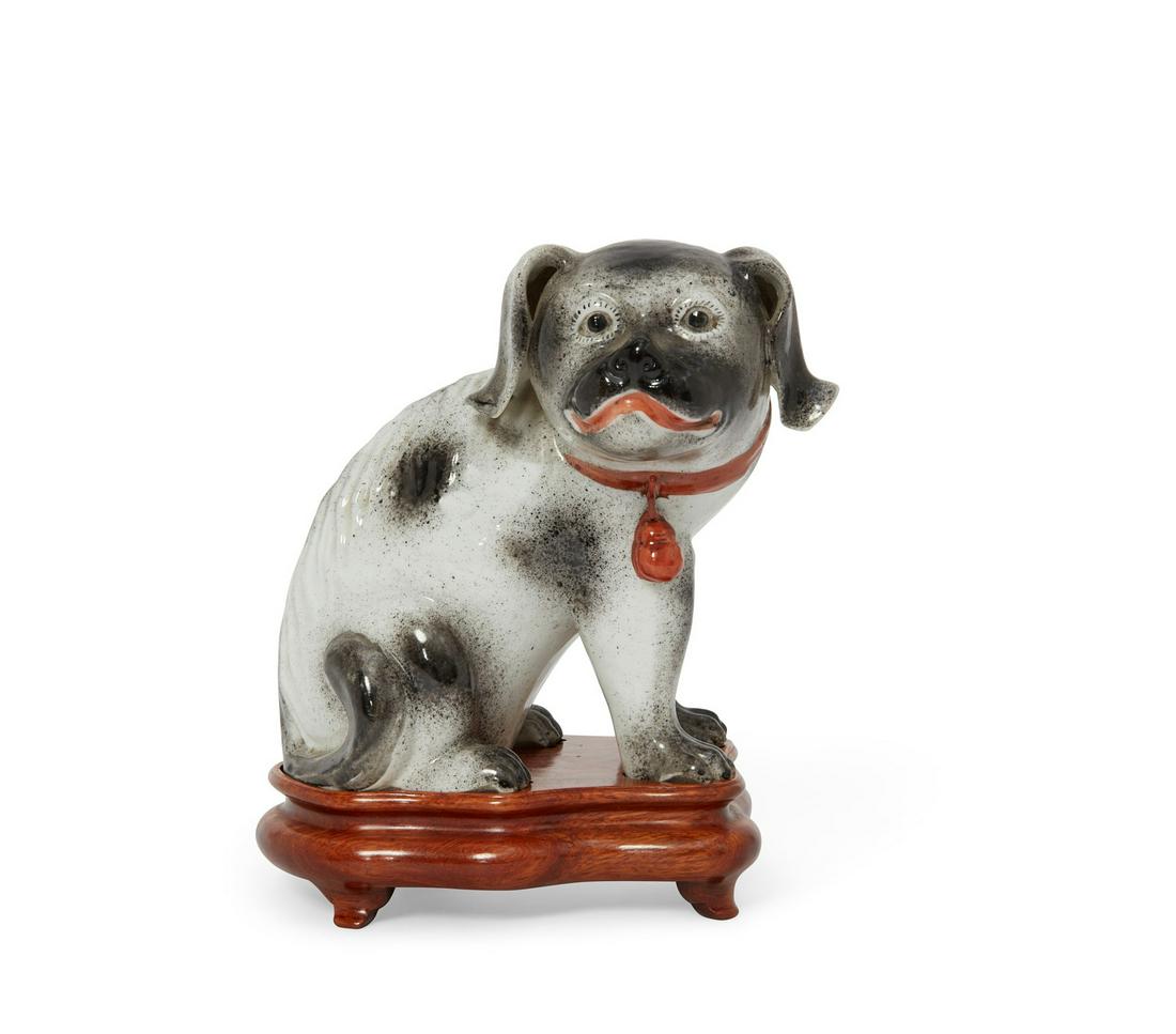 A Chinese porcelain model of a seated dog (1 of 4)