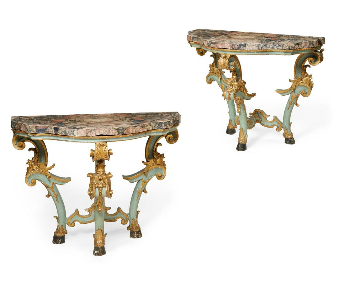 Pair of Italian Rococo blue painted console tables: A pair of Italian Rococo parcel gilt and blue painted console tablesprobably Venicemid 18th centuryWith fior di pesco veneered marble tops.height 35in (89cm); width 43in (109.5cm); depth 22 1/2in (57c