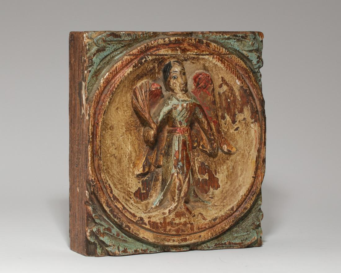 A Spanish Colonial decorated relief of an angel (1 of 3)
