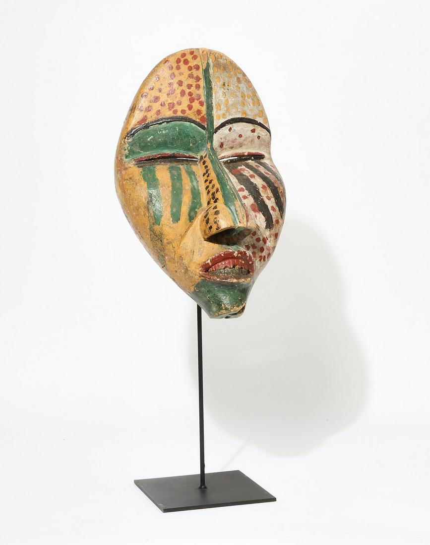 A Woyo polychrome decorated dance mask, Congo (1 of 6)