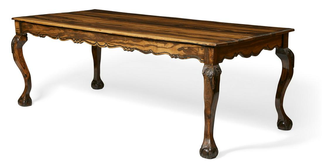 A Rococo style calamander dining table: An Indo Portuguese Rococo style calamander dining tablecomposed of antique and later elementsheight 31in (79cm); width 87in (221cm); depth 41 1/2in (105.5cm)