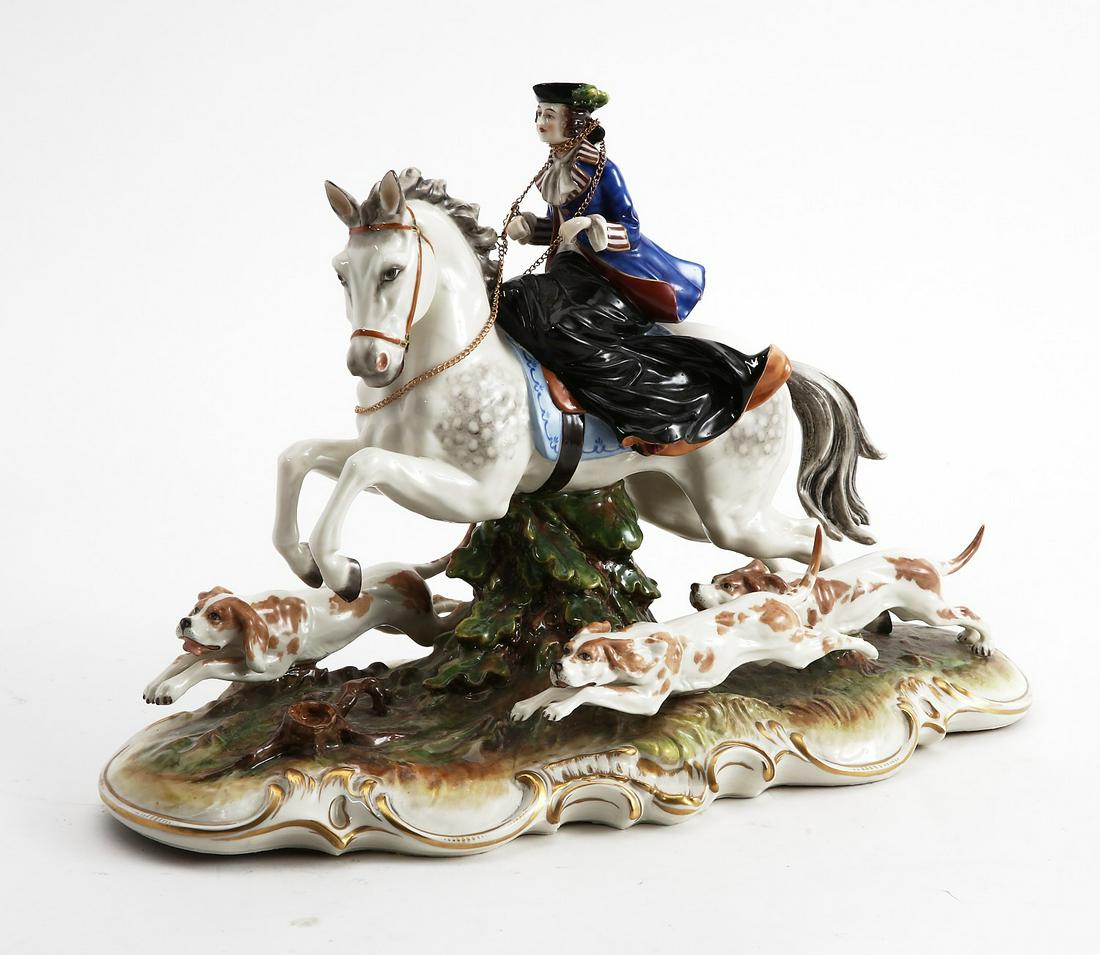 German Ackermann & Fritze porcelain figural group: A German (Ackermann & Fritze) porcelain figural group first half 20th century Underglaze blue crowned monogram mark. height 13in (33cm); length 18 1/2in (47cm); depth 8in (20cm) Provenance: Property f