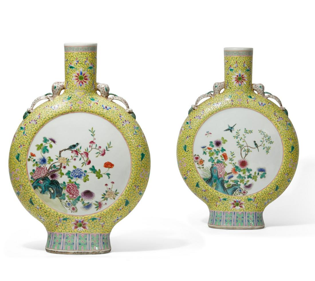 Pair Chinese Famille Rose porcelain moon flasks: A pair of Chinese Famille Rose yellow ground porcelain moon flasksWith six character marks to undersides.height 17 1/4in (44cm); width 12in (30.5cm); depth 3 1/2in (9cm)