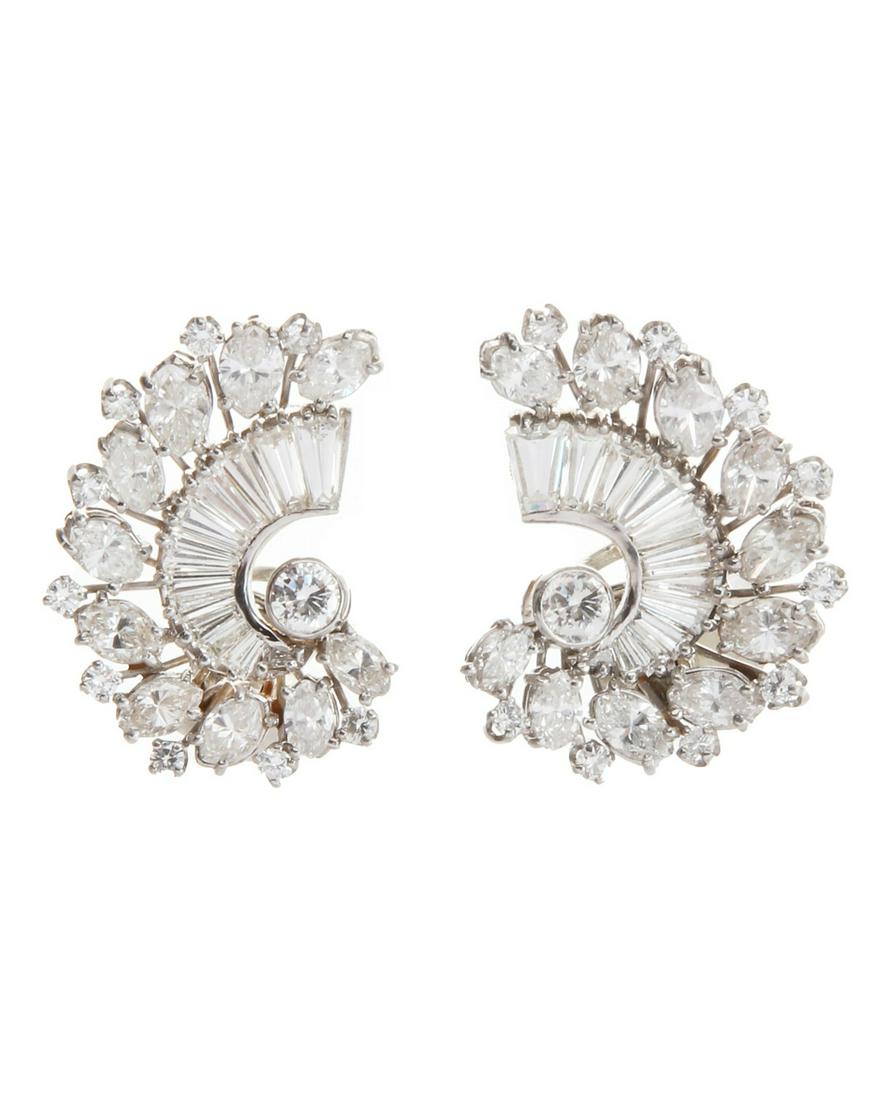 A pair of diamond and platinum ear clips (1 of 3)