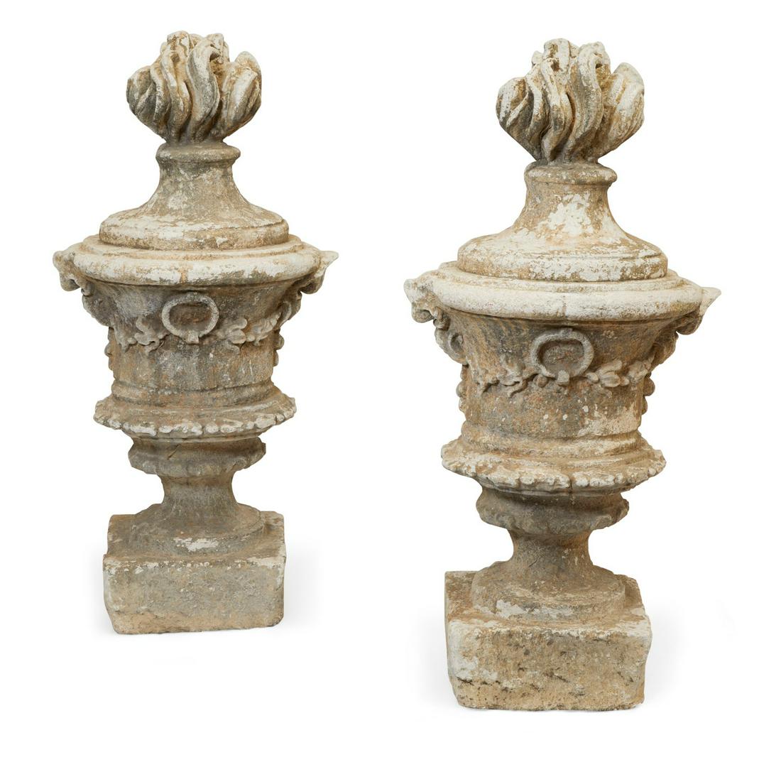 A pair of Neoclassical style composition urns (1 of 9)