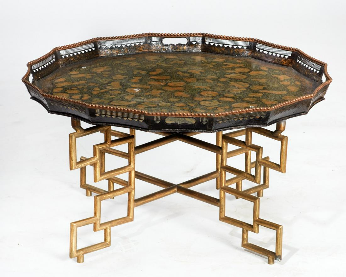 A metal and gilt decorated tray table (1 of 3)