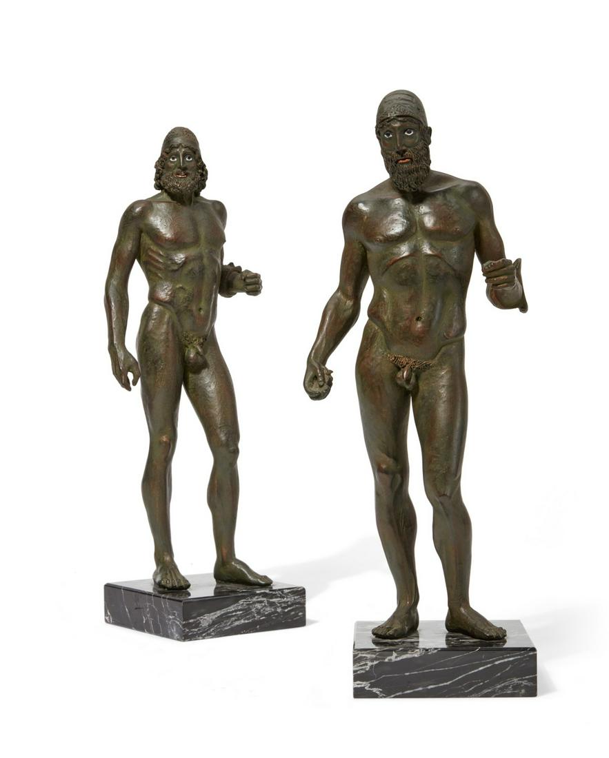A pair of faux bronze models of athletes (1 of 14)