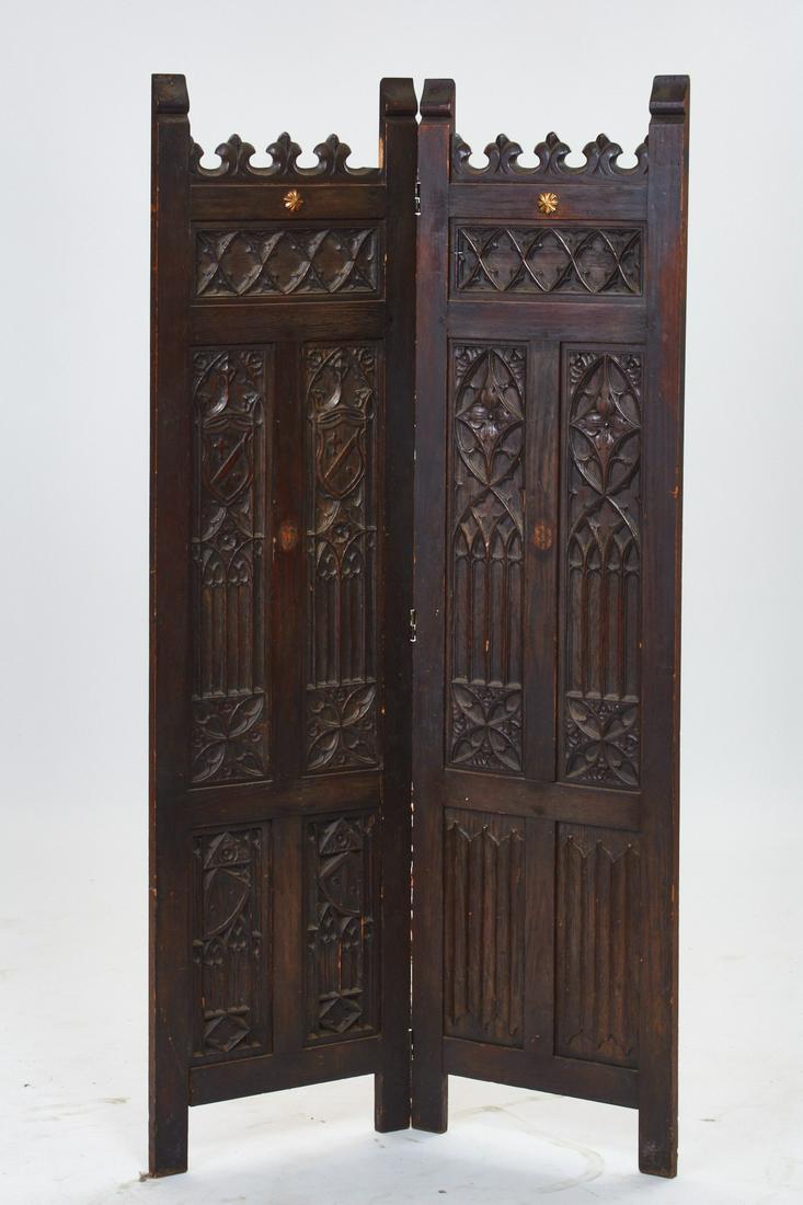 A Gothic style carved oak floor screen (1 of 3)