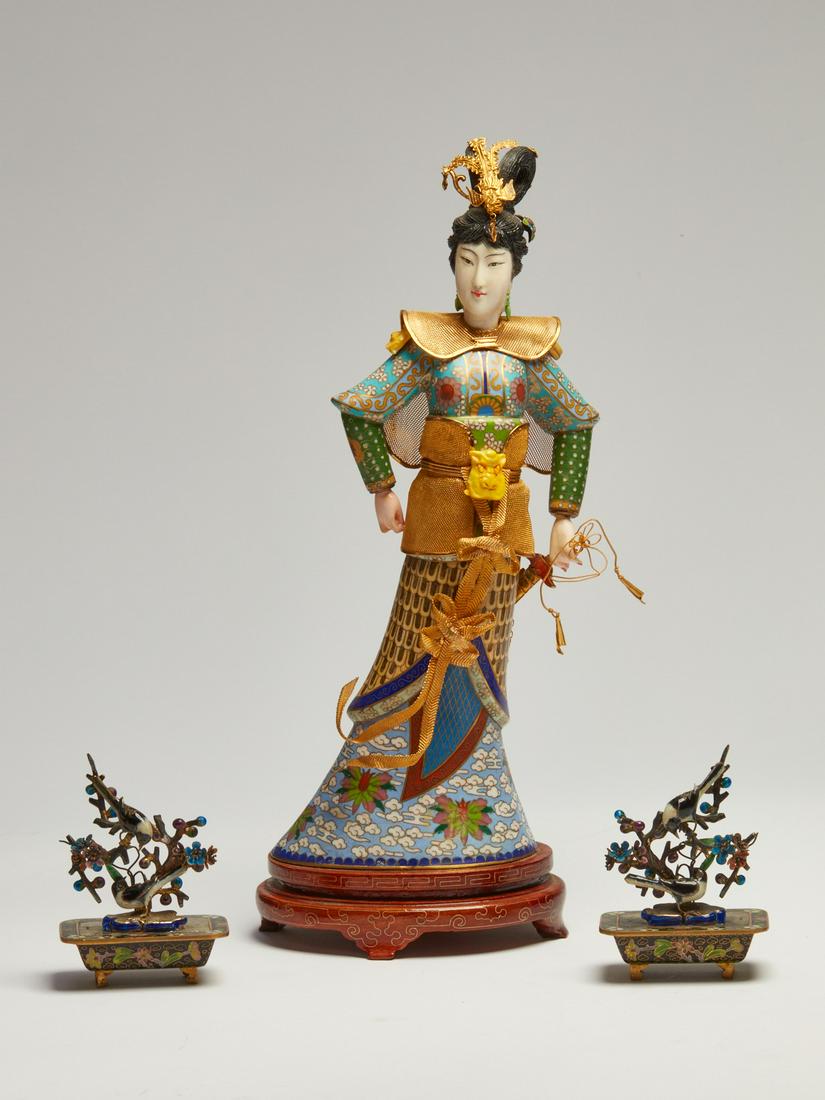 A Chinese porcelain and enamel model of a woman (1 of 3)