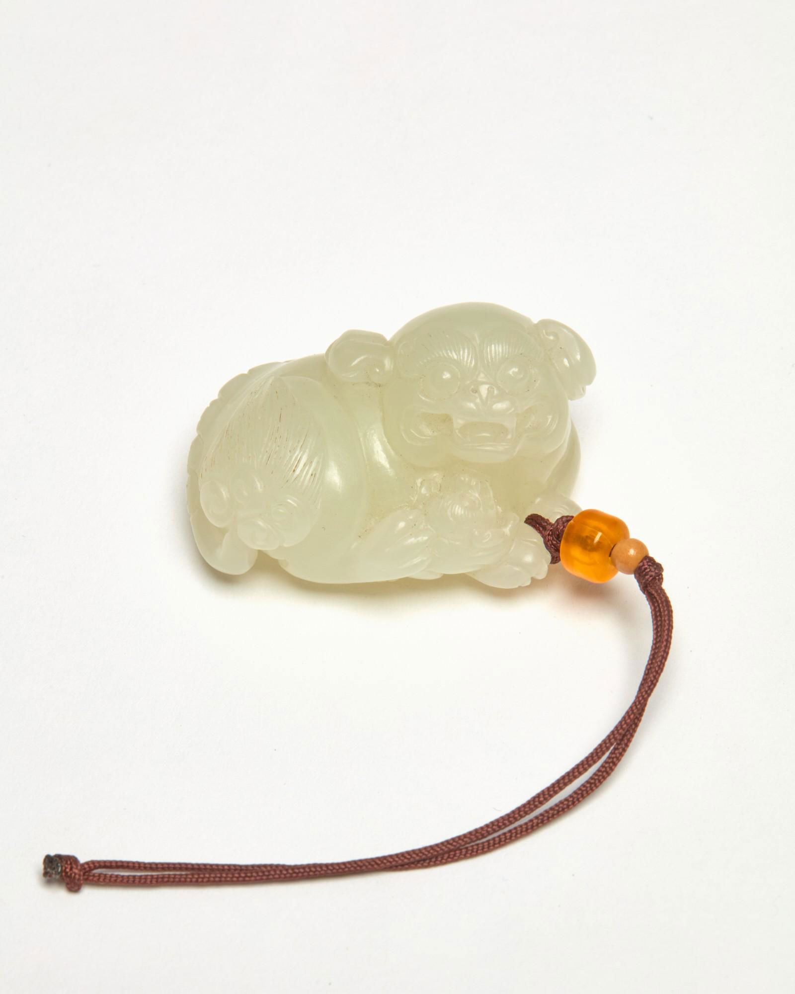 A Chinese hardstone figure of a dog (1 of 7)