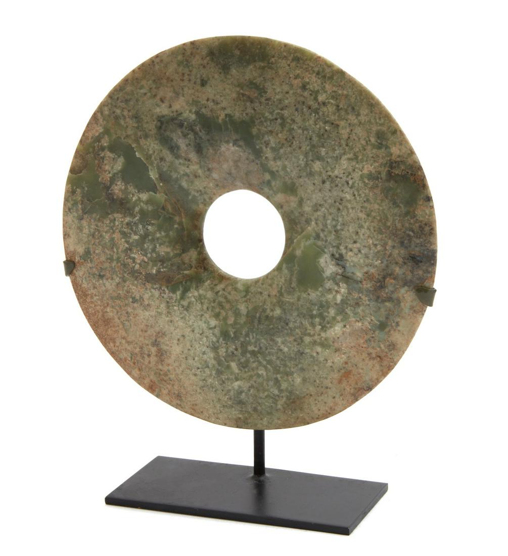 A Chinese carved jade bi disk (1 of 4)