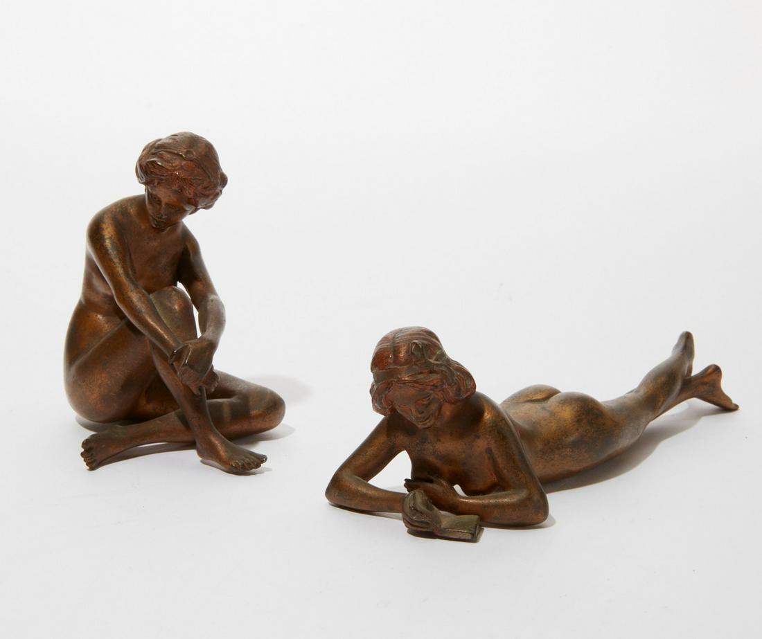 Two Austrian bronze models of nude women: Two Austrian patinated bronze models of nude women retailed by B. Altman & Co. late 19th/early 20th century length of largest 6 1/2in (16.5cm) Provenance: Property from the Gardner Family Estate.