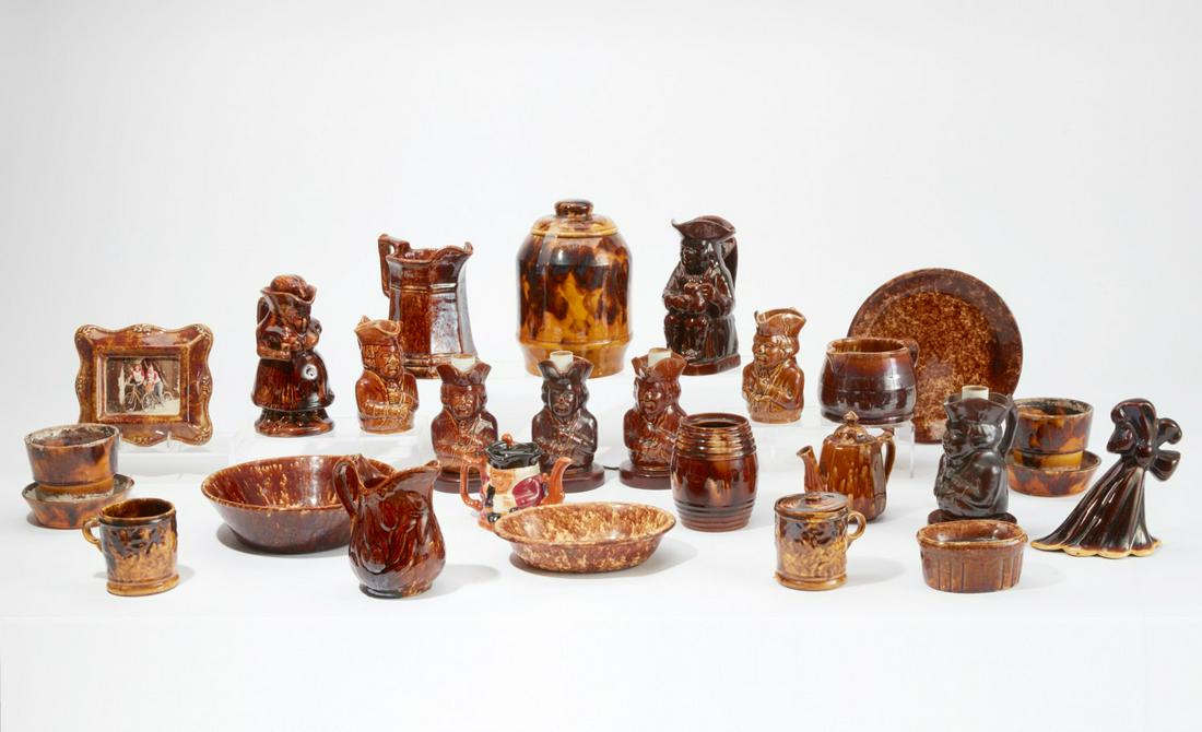 A group of glazed pottery Toby jugs and vessels (1 of 5)
