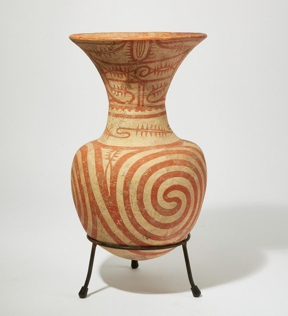 A Southeast Asian red and white pottery vase (1 of 3)