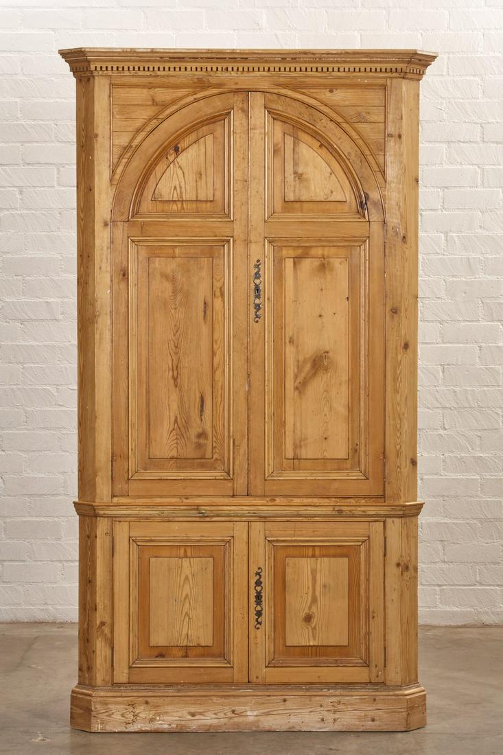 A George III style pine corner cabinet: A George III style pine corner cabinet 20th century height 90in (229cm); width 47in (120cm); depth 32in (81cm)