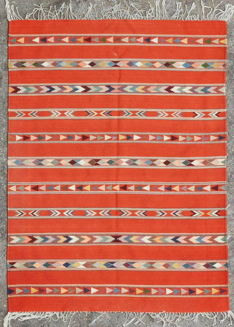 A Southwest woven orange ground rug/textile (1 of 3)