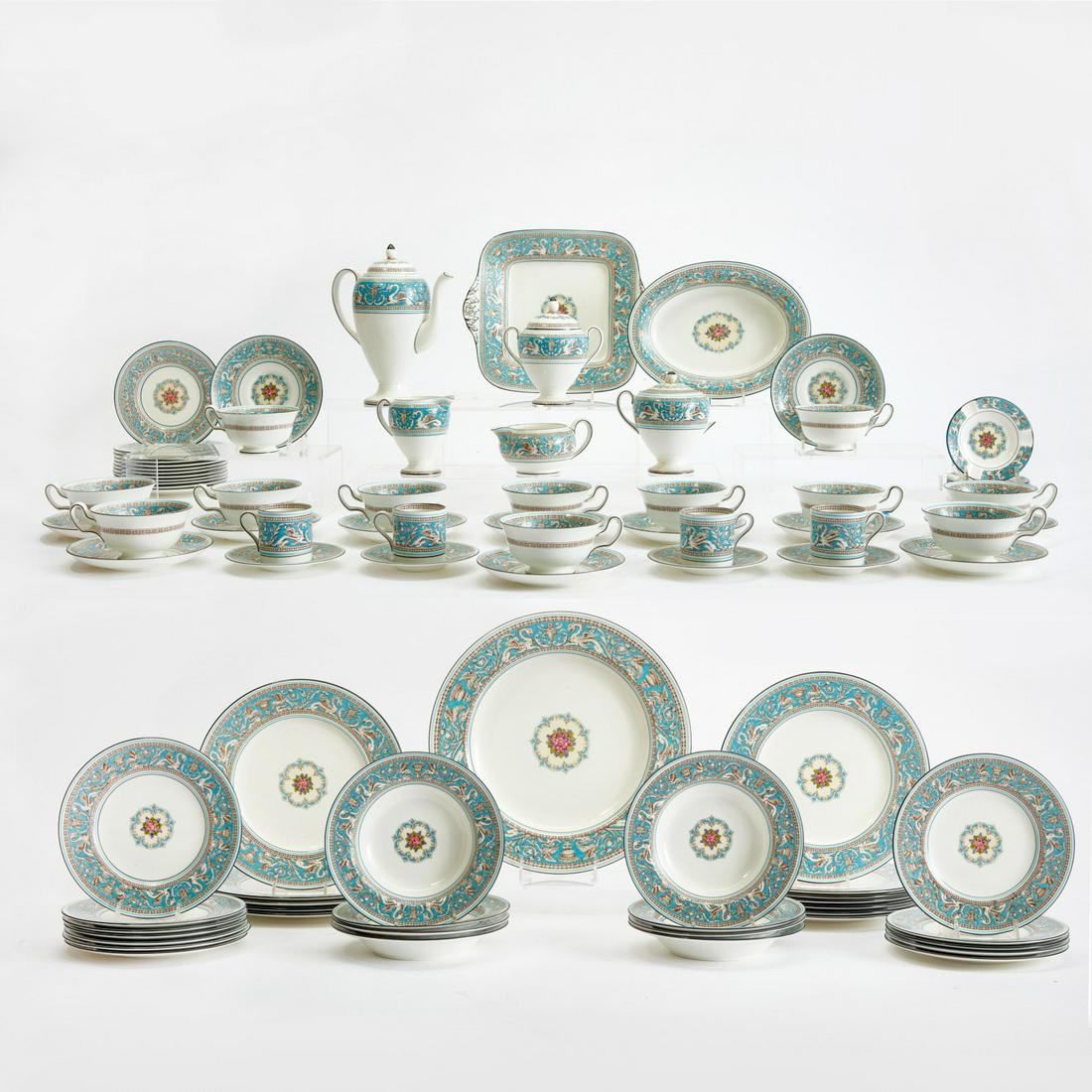A Wedgwood porcelain Florentine Turquoise Rim set: A Wedgwood porcelain part dinner and tea service in the Florentine Turquoise Rim pattern post 1950 Comprising twelve 10 3/4in dinner plates; twelve 8in salad plates; twelve 6in bread and butter plates