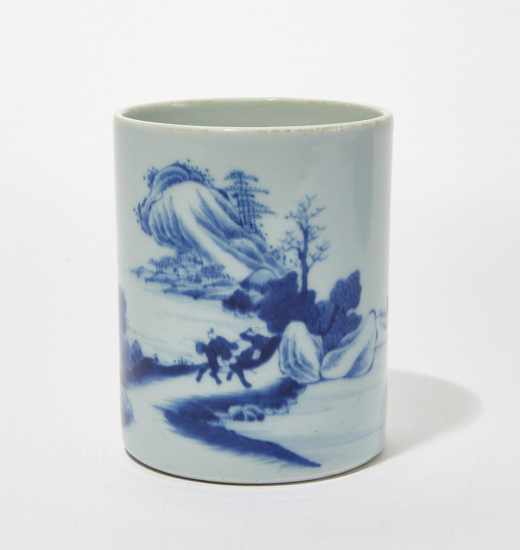 A Chinese blue and white porcelain brush pot: A Chinese blue and white porcelain brush pot height 5in (13cm); diameter 4in (10cm)