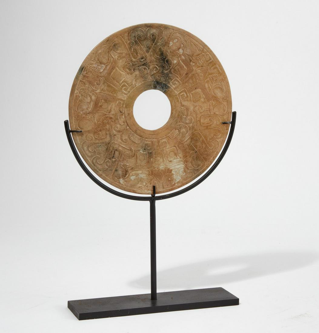 A Chinese hardstone bi disk (1 of 2)