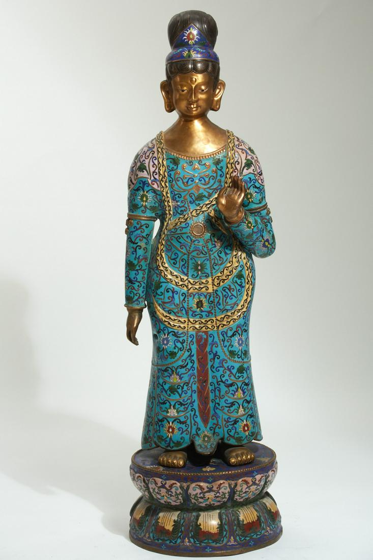 A gilt and cloisonne enamel Buddhist figure: A gilt and cloisonne enamel standing Buddhist figure height 46in (117cm); width 13in (33cm); depth 13in (33cm)