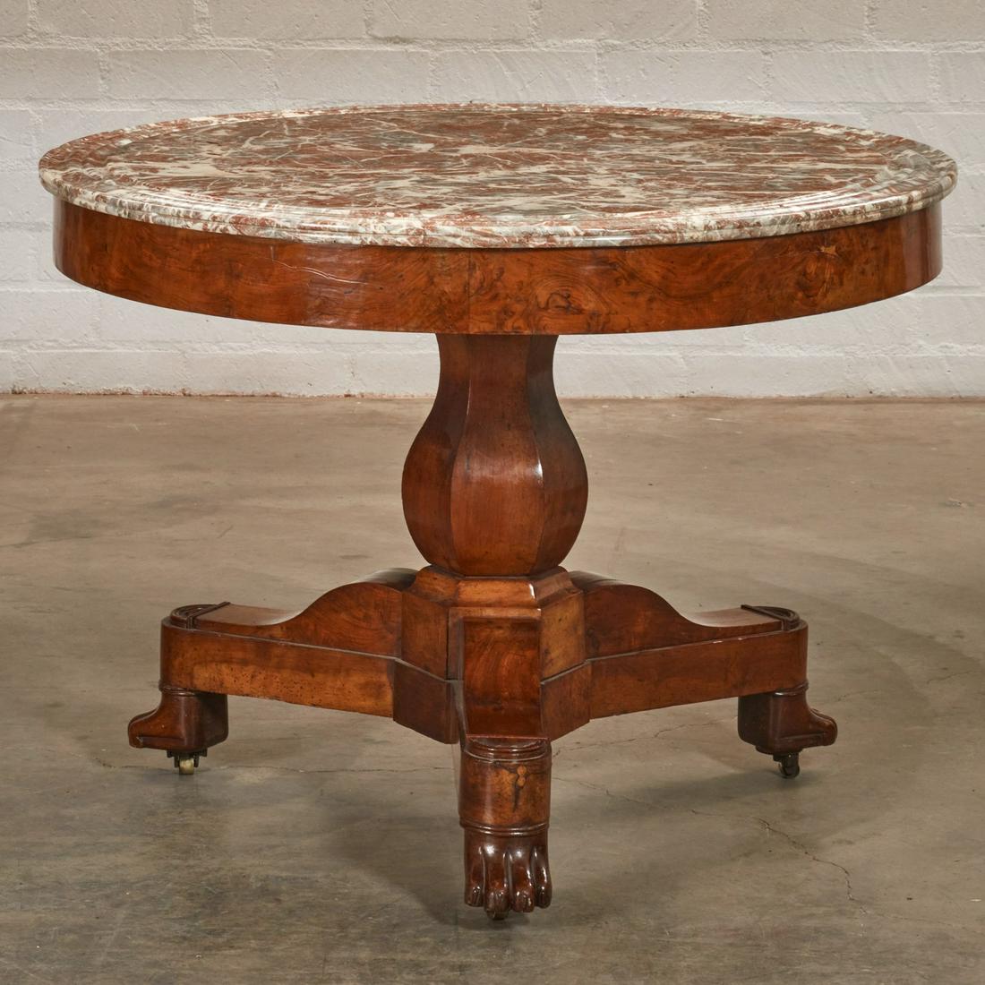 A Charles X walnut center table (1 of 4)