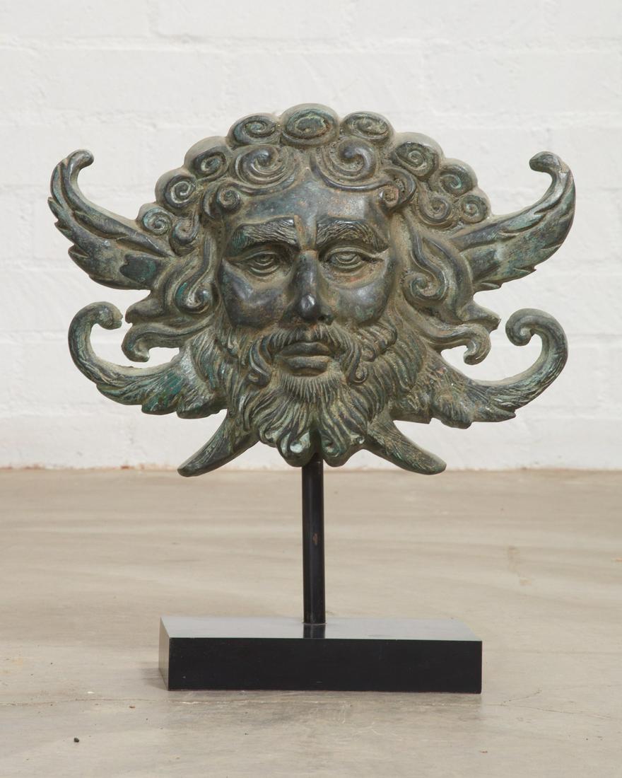 A Baroque style patinated metal mask (1 of 3)