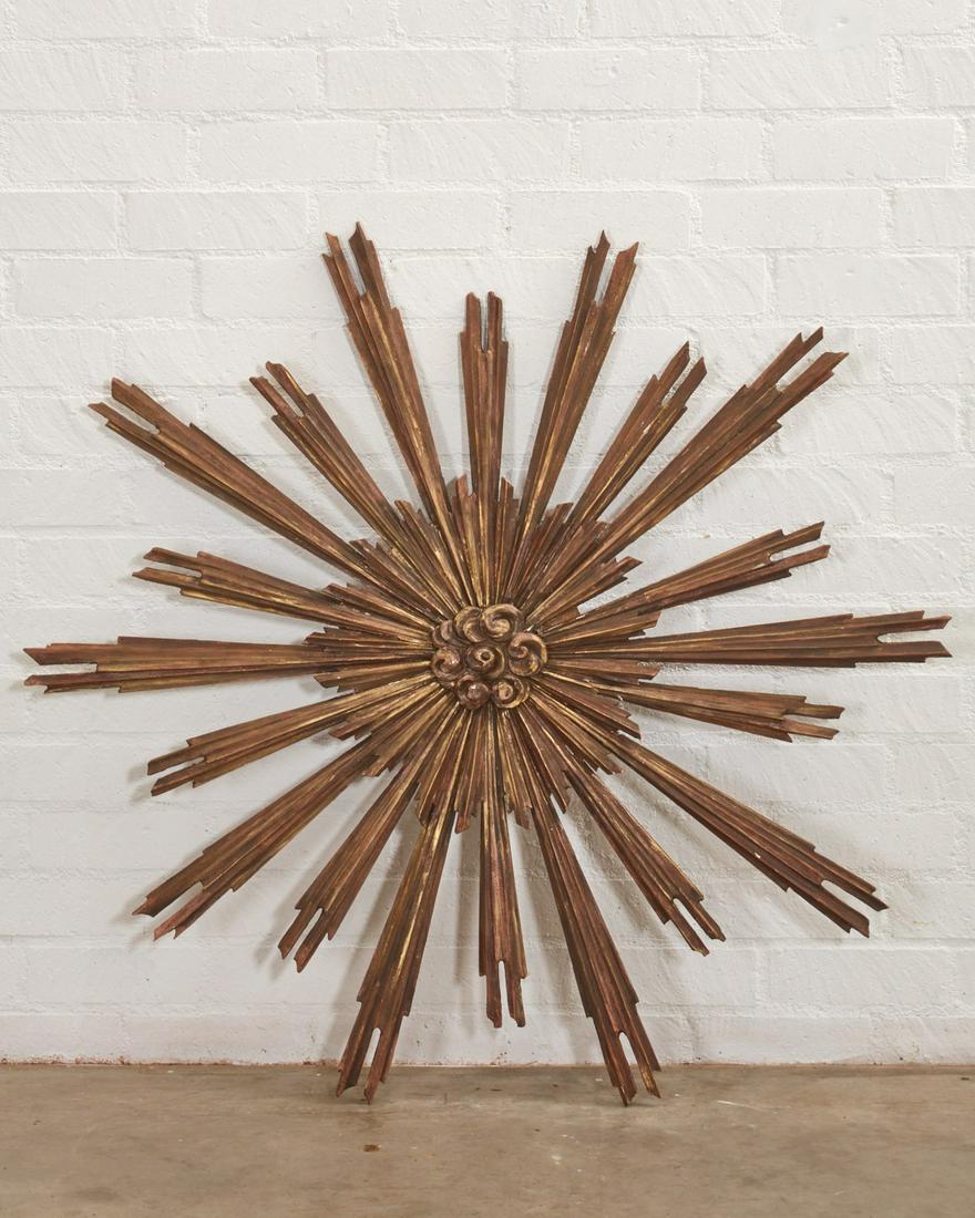 A Continental decorative sunburst (1 of 3)