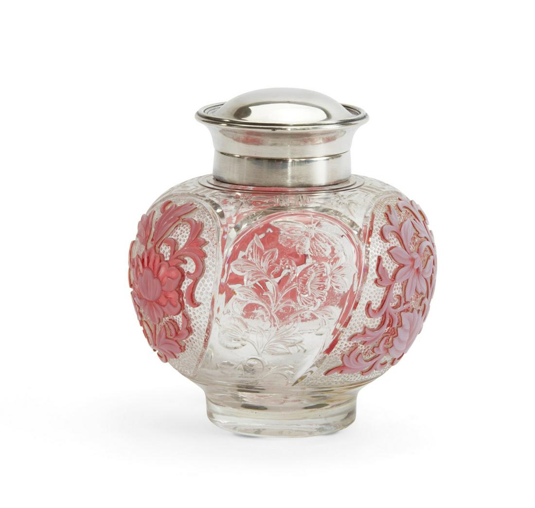 A Thomas Webb silver, cameo glass ink well: A Thomas Webb silver mounted 'rock crystal' cameo glass ink wellearly 20th centuryThe cameo floral panels against a dotted ground interspaced by clear panels of floral sprays and butterflies, etched f